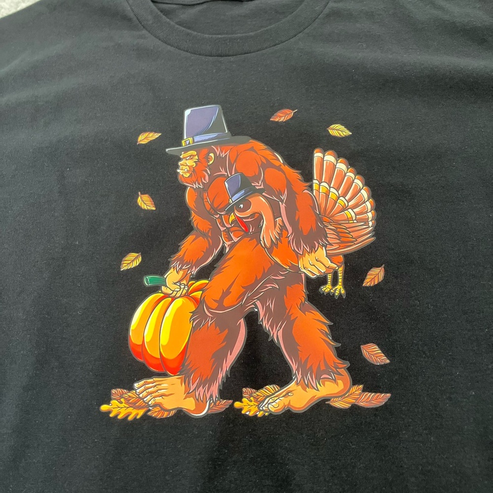 Big Foot Sasquatch Thanksgiving Pumpkin Turkey Fall Leaves Black Tee